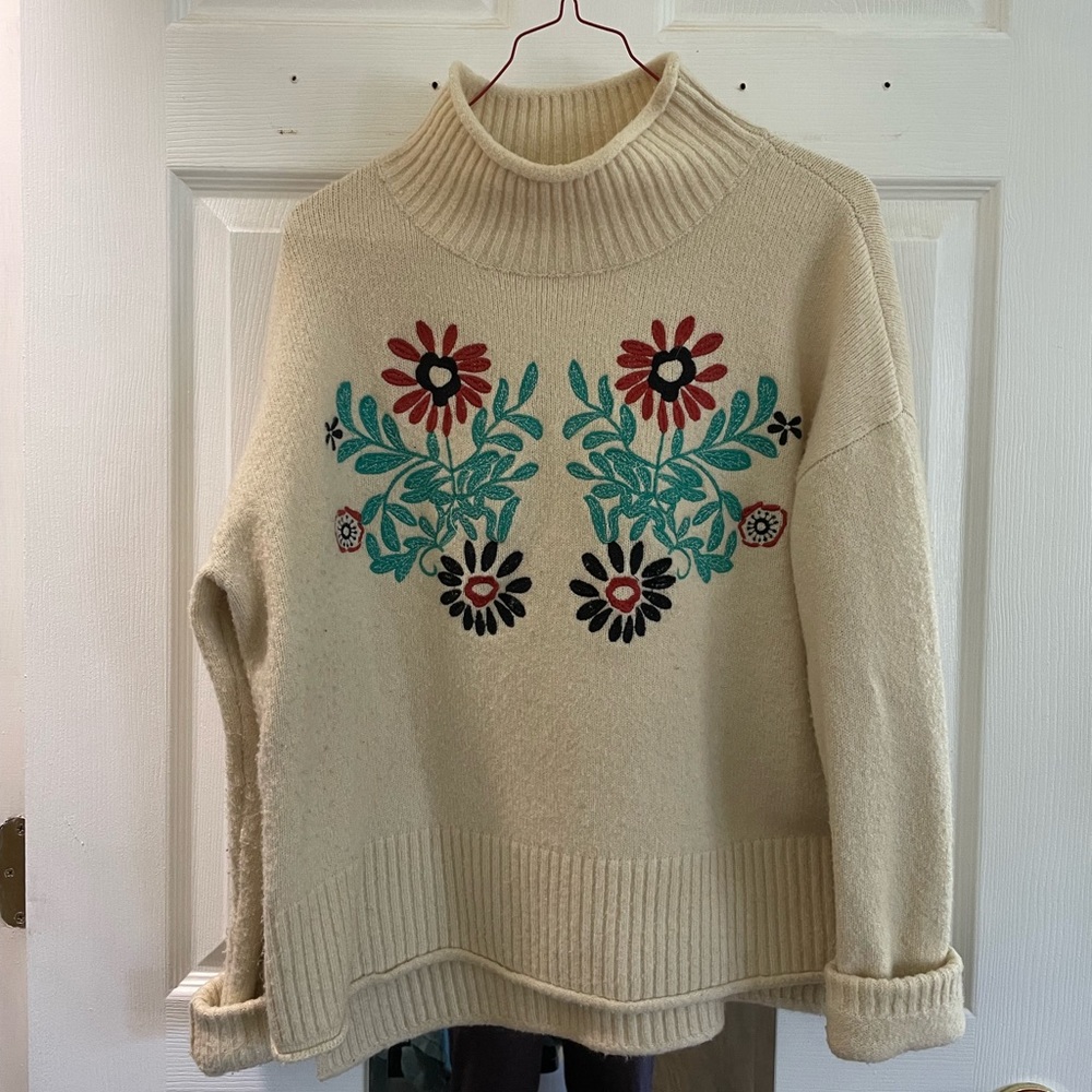 Cream embroidered Roolee turtle neck sweater